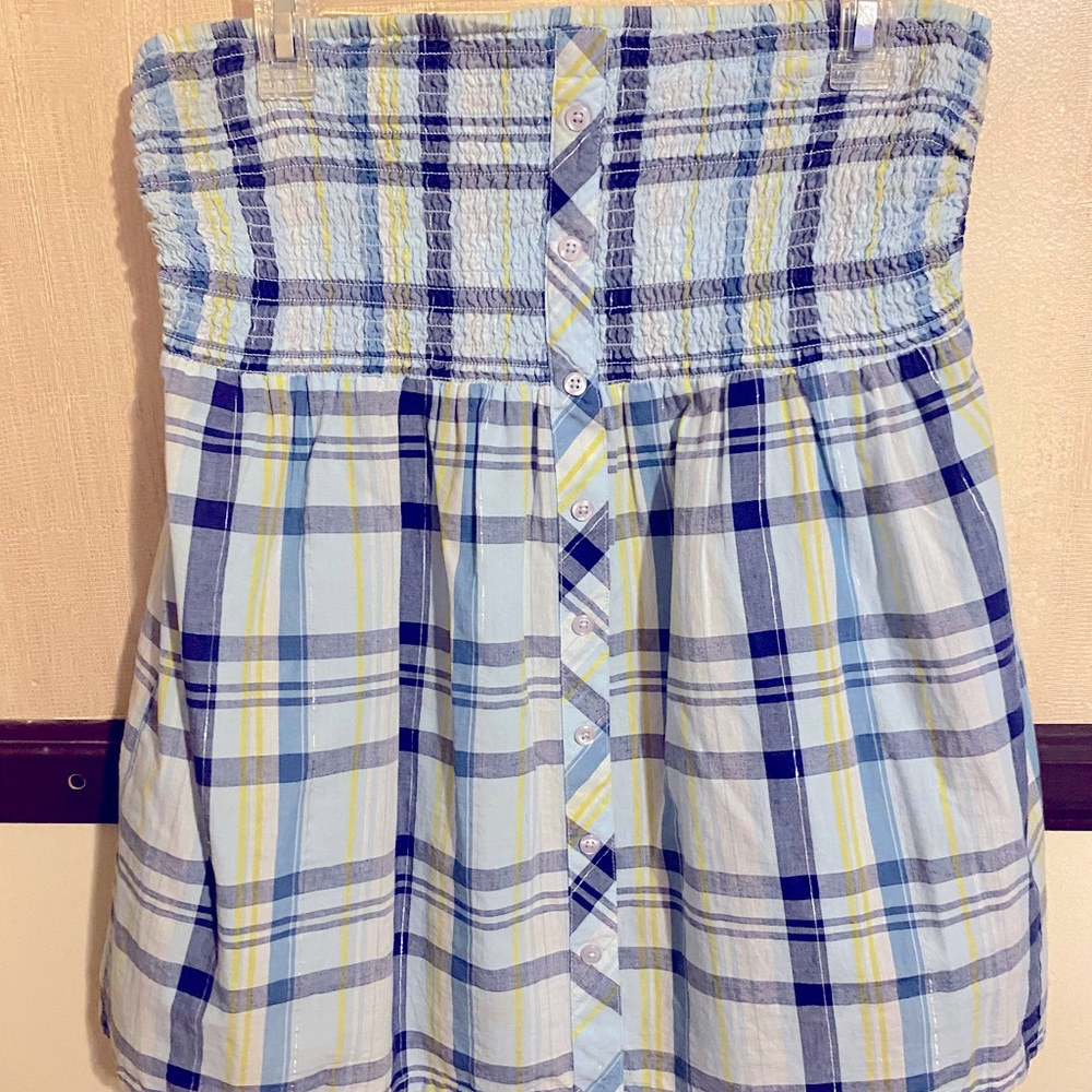 Women’s Size 12 cute strapless top.  Rock it with some jeans, leggings or skirt!